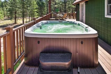 Happy Jack Getaway with Hot Tub and Wraparound Porch! - image 5